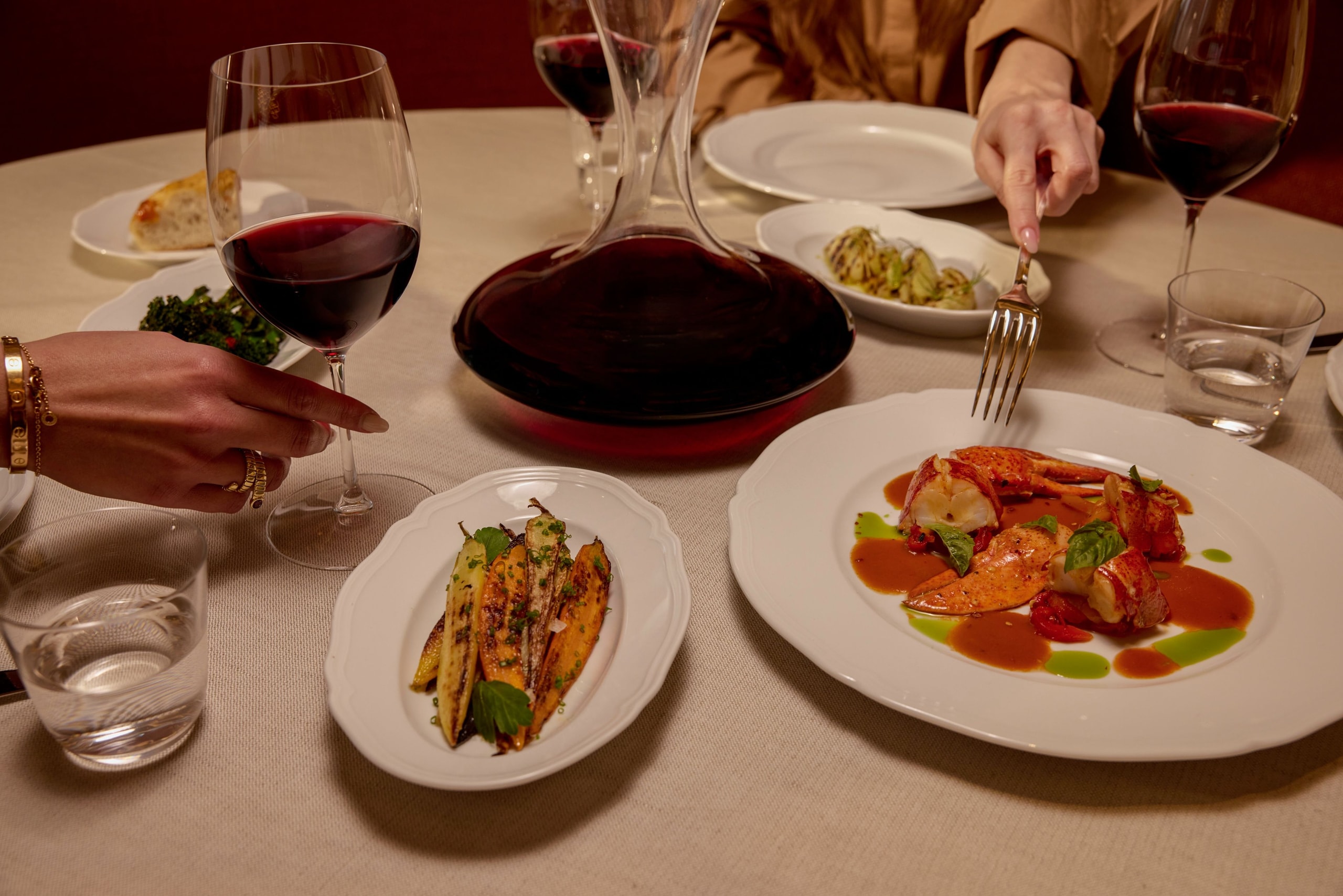 Seia Miami Dinner Tablescape With Red Wine